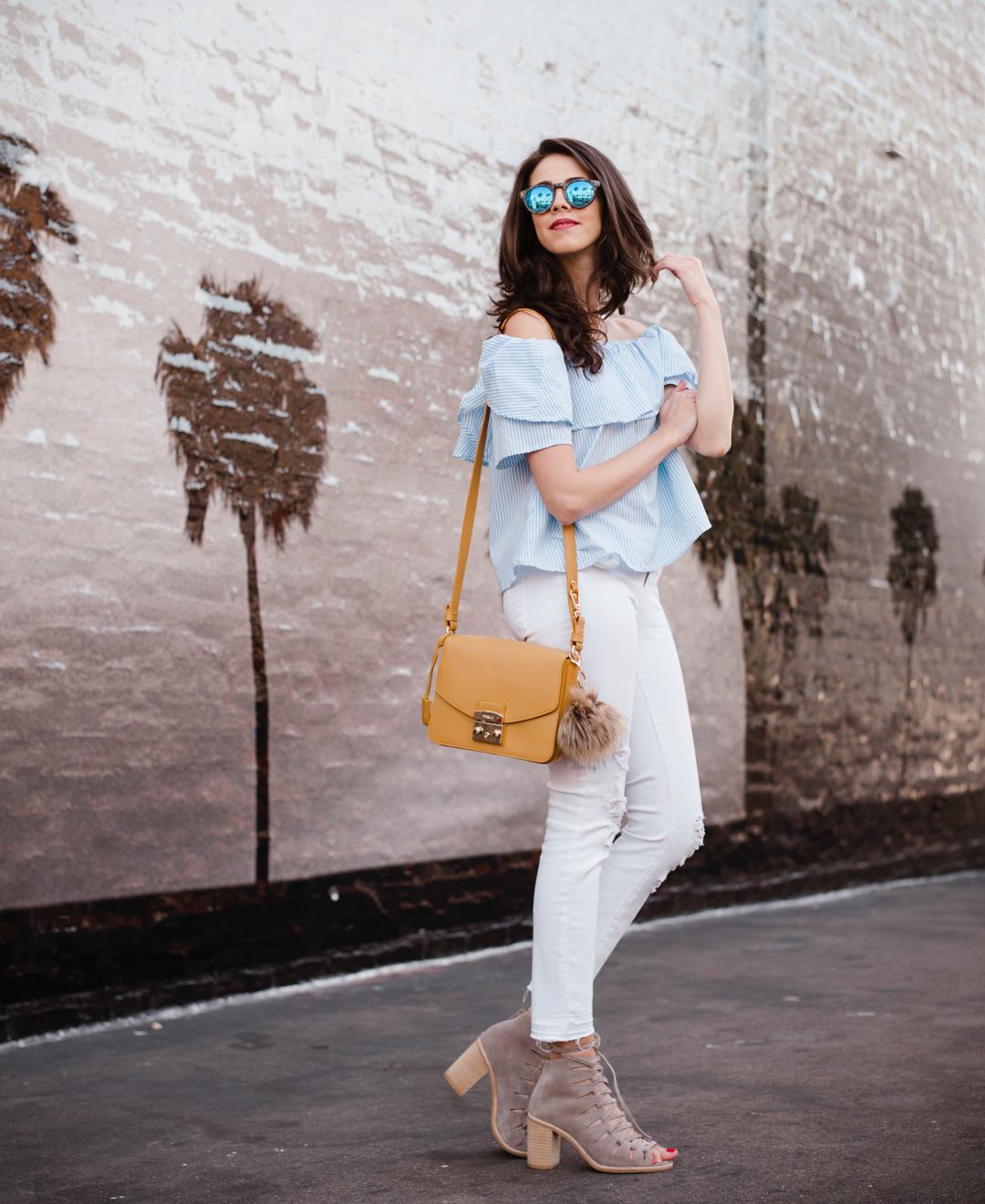 Shein off-the-shoulder top, J Brand Jeans and Taudrey Necklace , Furla bag, Illesteva sunglasses, Jefferey Campbell Shoes.