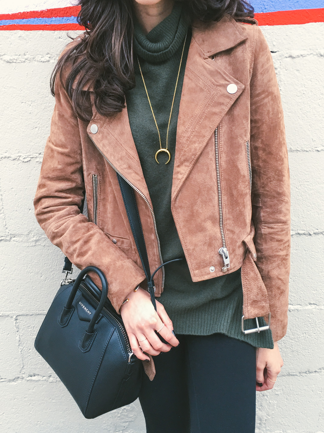 Jackie Roque styling a Blank NYC Suede Jacket with Rag and Bone Jeans, a Givenchy Mini Antigona Bag and a Gorjana necklace 