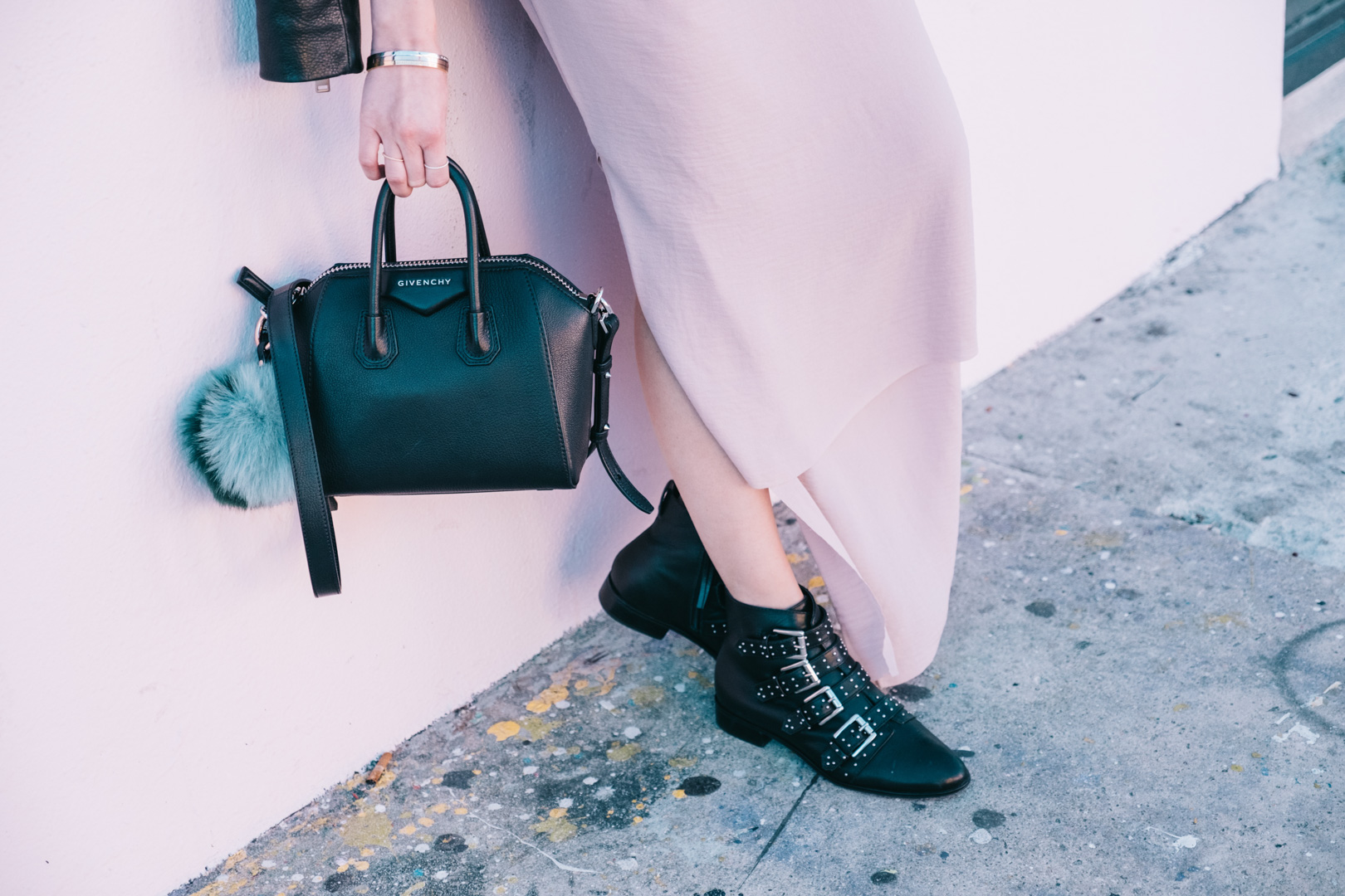 Jackie Roque styling a Givenchy Mini Antigona bag and Rebecca Minkoff Black Boots with a COS blush dress