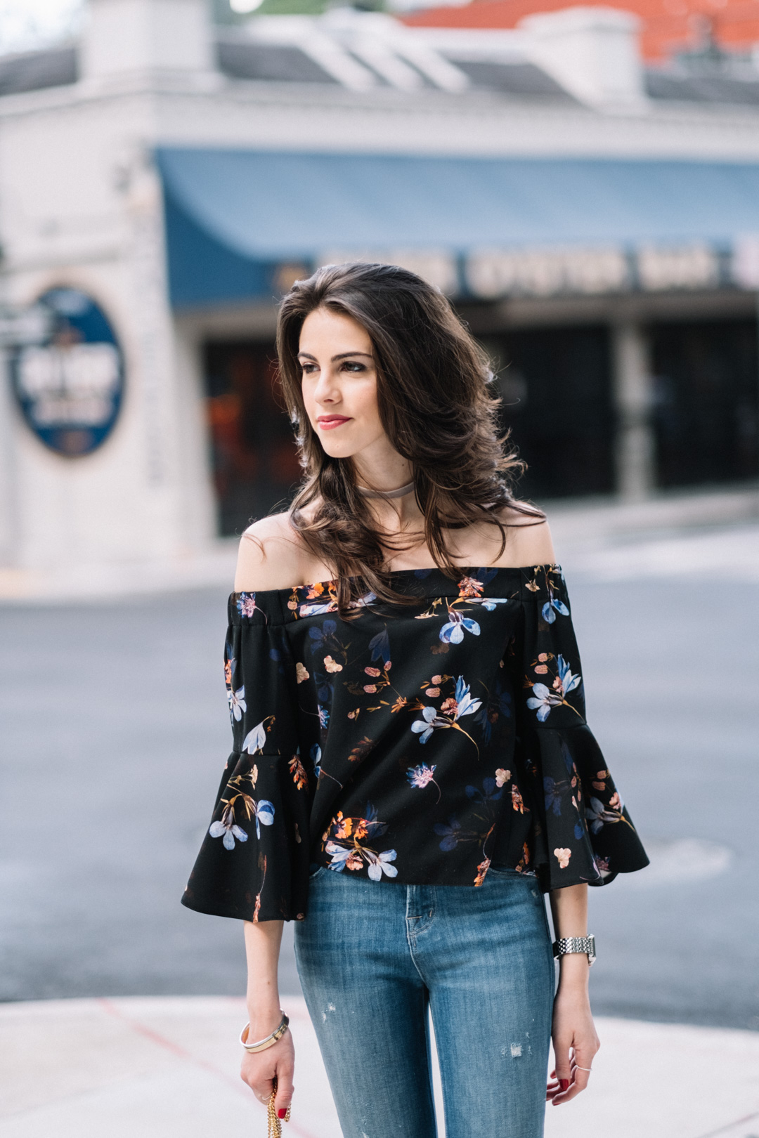 Jackie Roque styling a Toyshop off-the-shoulder floral top, with J Brand Alana ripped jeans, Chloe Drew bag and Joie Pippi shoes.