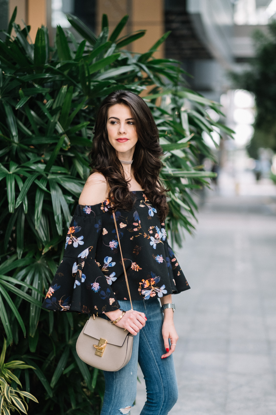 Jackie Roque styling a Toyshop off-the-shoulder floral top, with J Brand Alana ripped jeans, Chloe Drew bag and Joie Pippi shoes.
