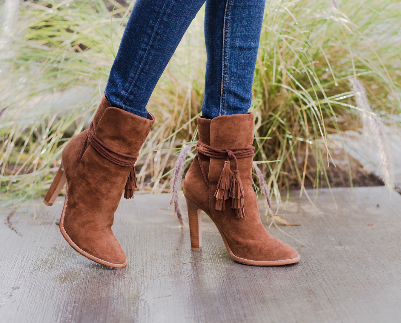 Jackie Roque styling the Joie Chap suede bootie in brown.