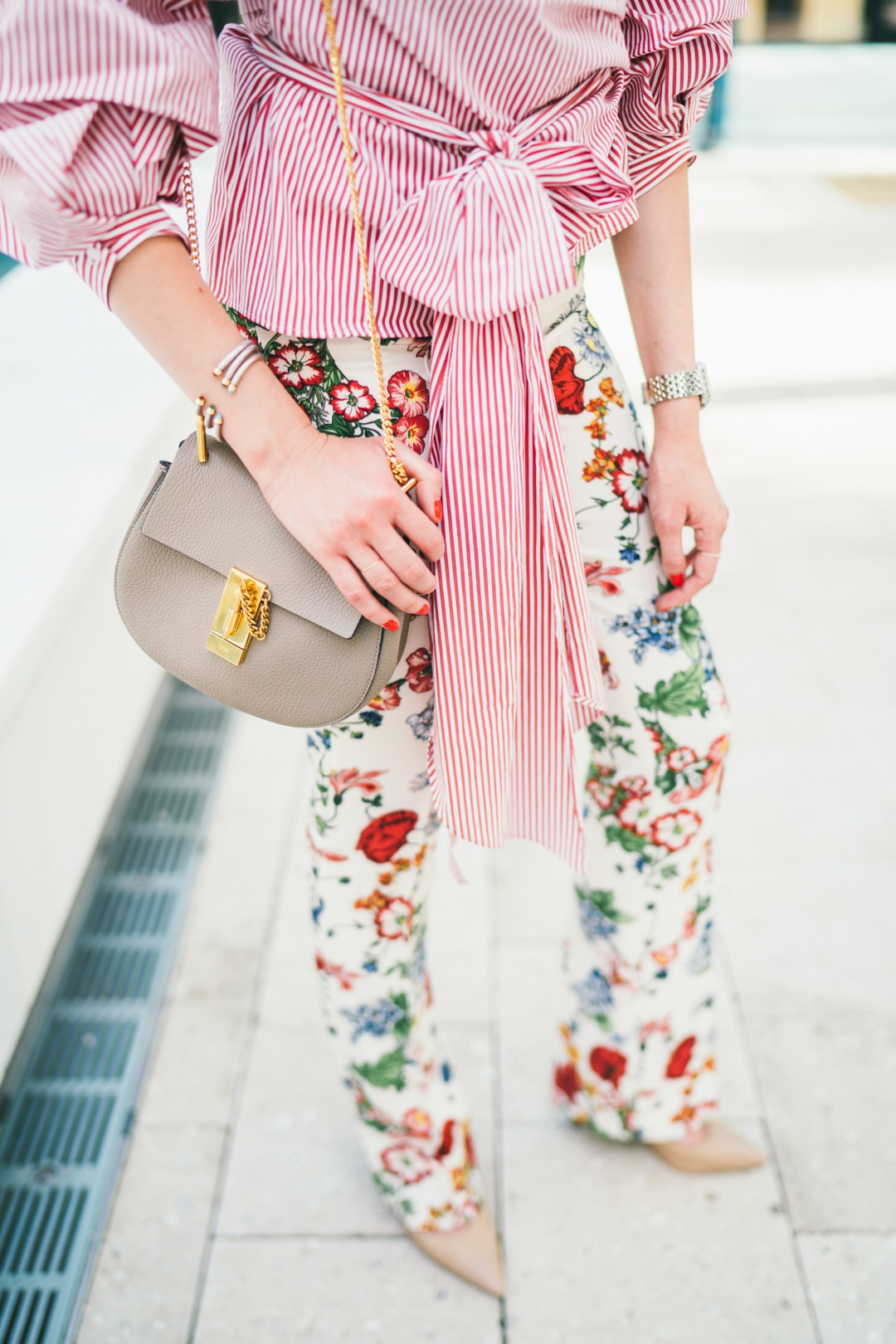 Jackie Roque mixing prints in Miami with the Chloe Drew Bag.