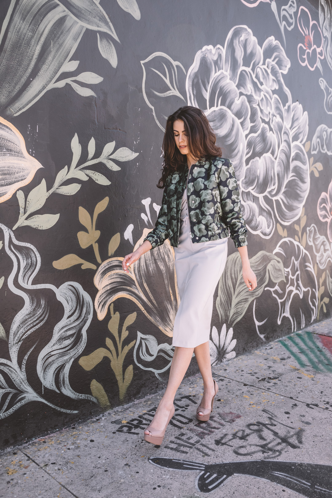 Jackie Roque styling a Topshop dress and Banana Republic jacket in Wynwood Miami.