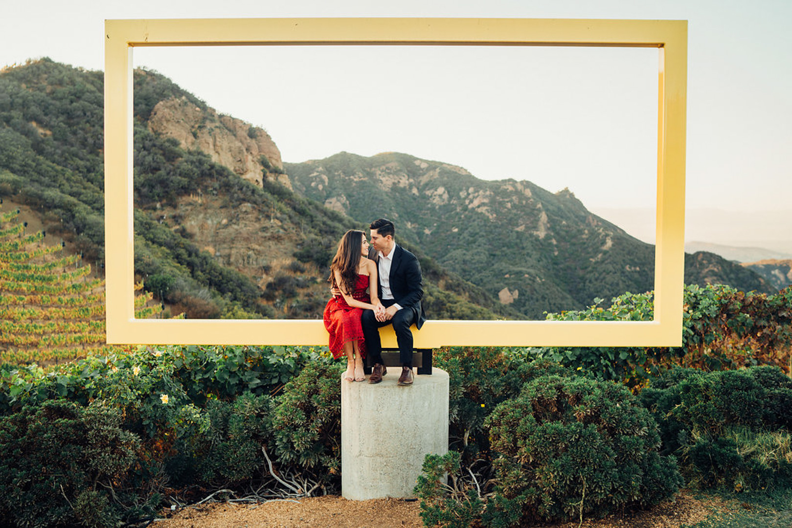 Jackie and Luke take engagement pictures at a vineyard in Malibu. 
