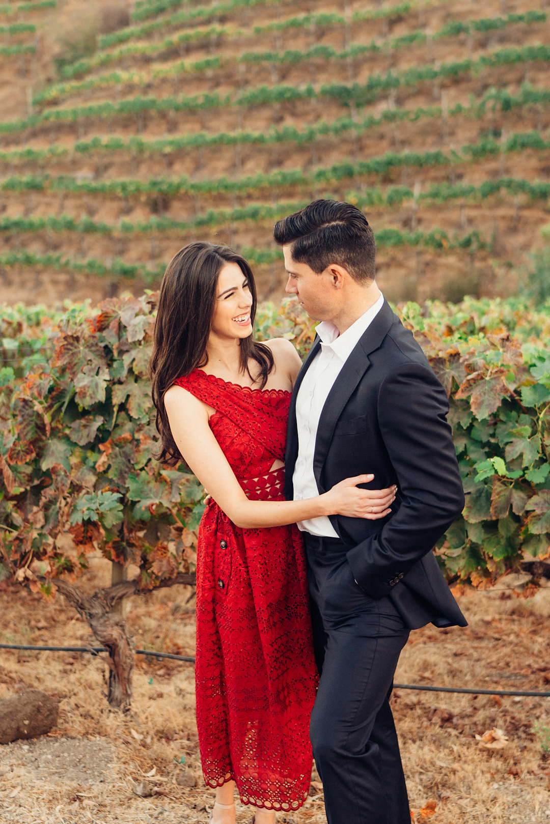 Jackie and Luke take engagement pictures at a vineyard in Malibu. 
