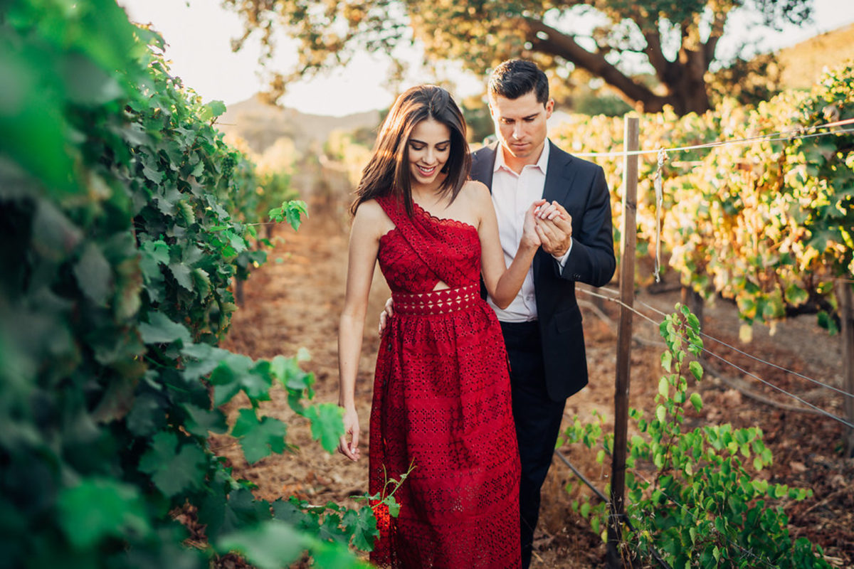 Jackie and Luke take engagement pictures at a vineyard in Malibu.