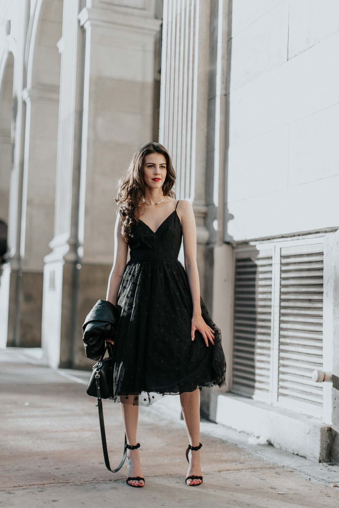 Jackie Roque styling a date night outfit from J.Crew star tulle dress in Miami.