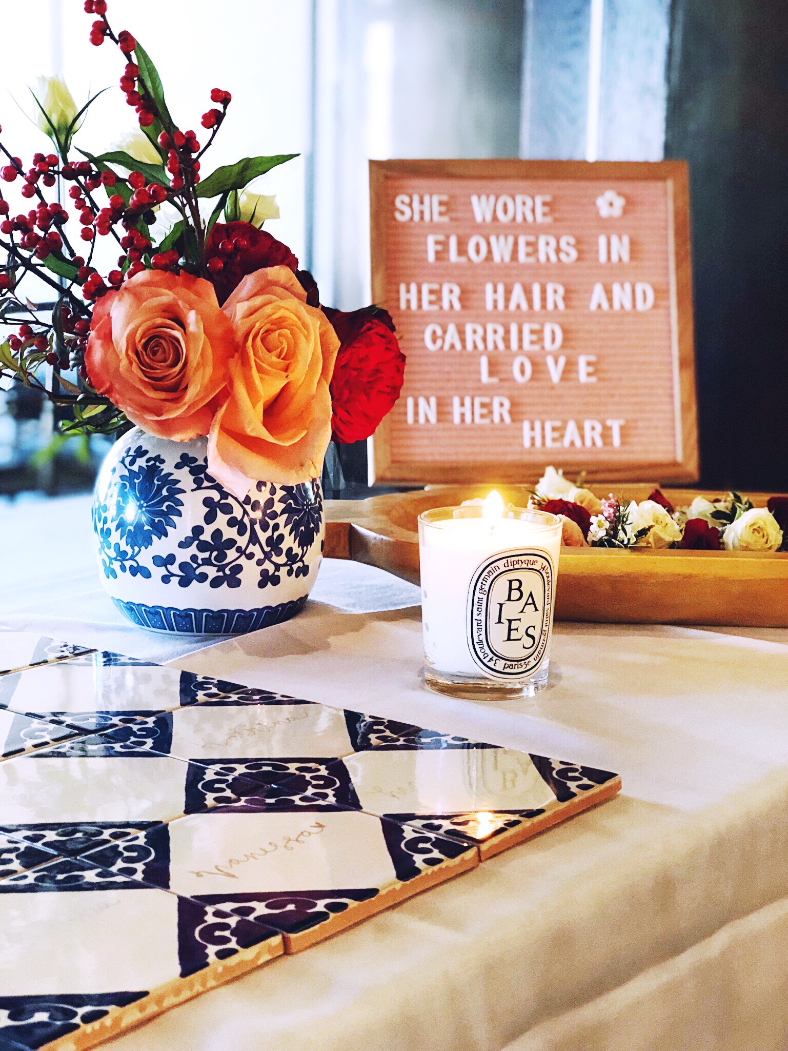 Jackie Roque's Spanish themed bridal shower in Miami featuring Ever After Florlals and blue and white porcelain vases and Diptyque Baies Candles.