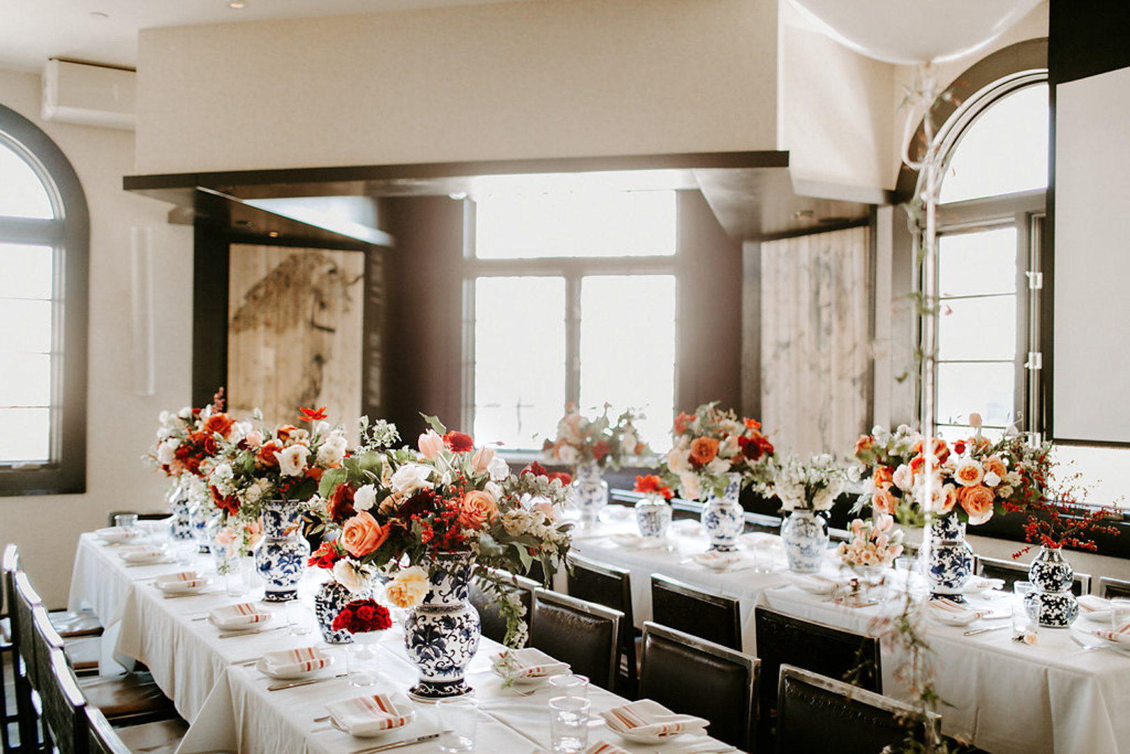 Jackie Roque's Spanish themed bridal shower in Miami featuring Ever After Florlals and blue and white porcelain vases.