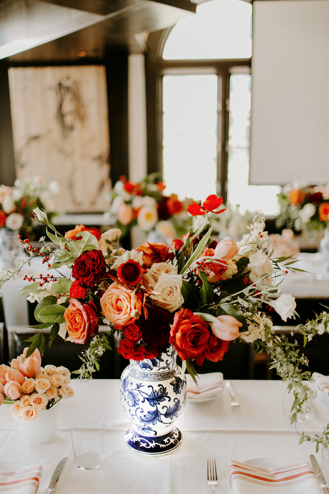 Jackie Roque's Spanish themed bridal shower in Miami featuring Ever After Florlals and blue and white porcelain vases