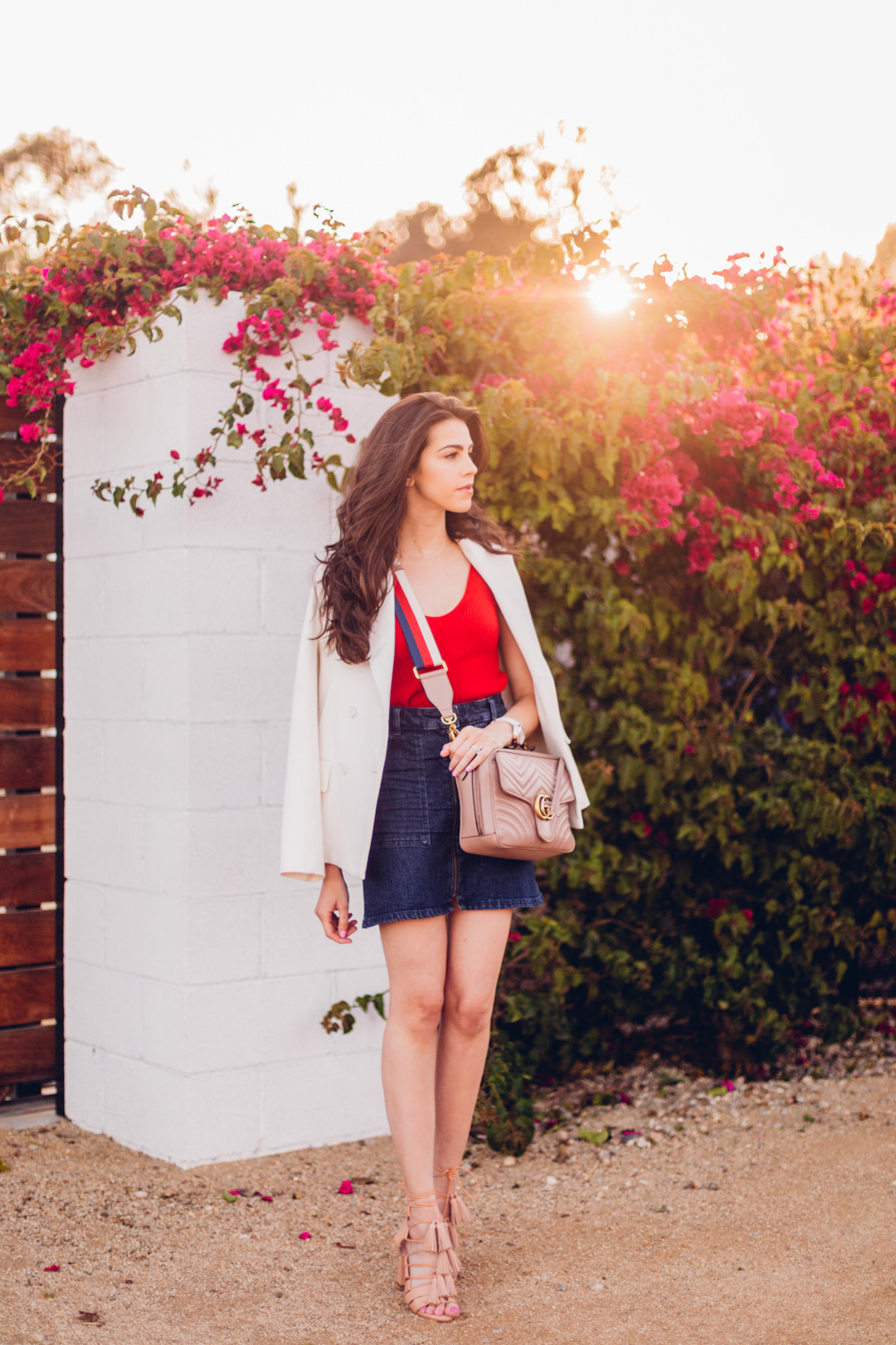Jackie Roque styling a red, white and blue outfit in Malibu. Featuring the Gucci GG Marmont Shoulder Bag 