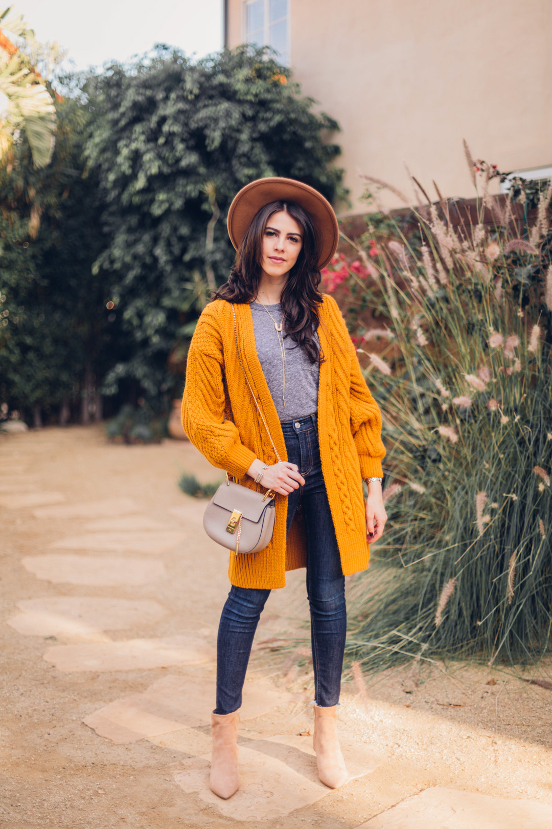 Jackie Roque Salas styles a Topshop yellow cardigan and Fall style look in Malibu.