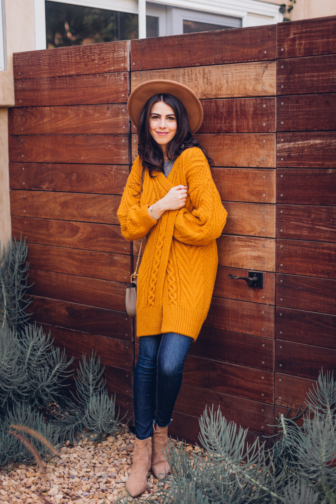 Jackie Roque Salas styles a Topshop yellow cardigan and Fall style look in Malibu.