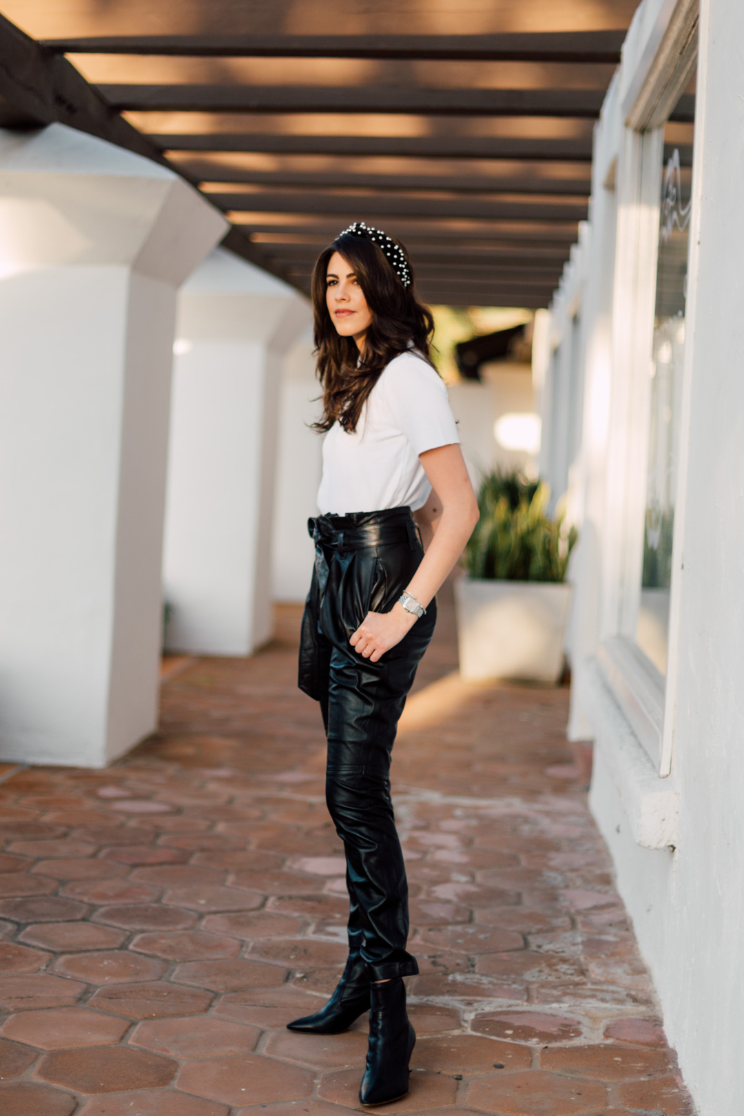 Jackie Roque Salas styling leather pants in Malibu