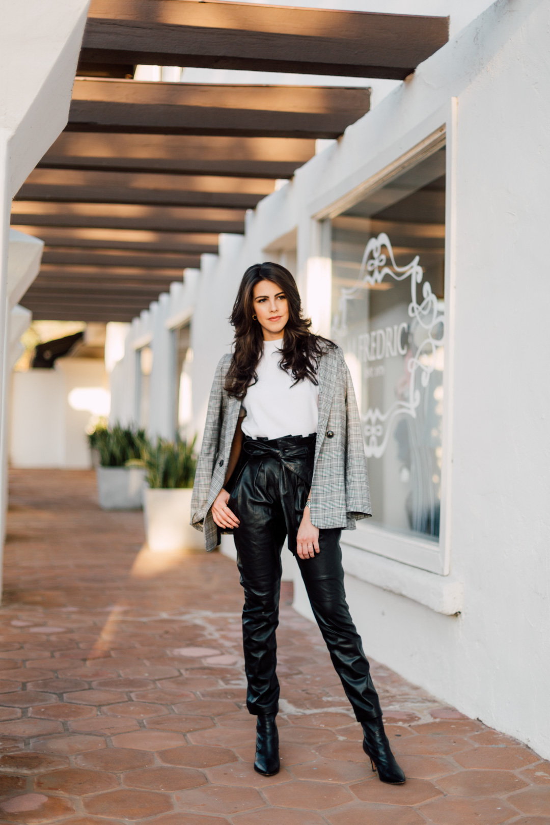 Jackie Roque Salas styling leather pants, Anine Bing blazer and a white tee in Malibu.